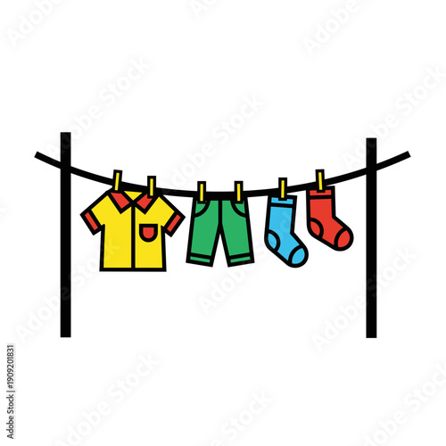 Colorful clothes hanging on a clothesline for laundry drying  