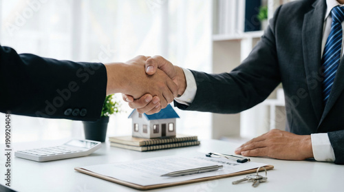 Handshake real estate deal agreement property contract success between businessman client professional broker