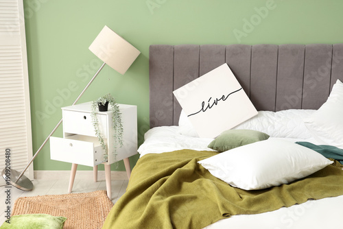 Interior of messy bedroom w...