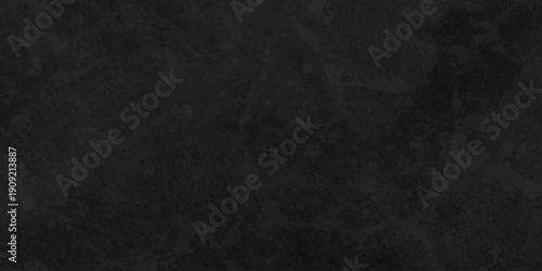 Distressed rough black grunge cracked wall slate texture. Chalk board and Black board grunge backdrop background. Wall grunge backdrop rough background dark black and stone.