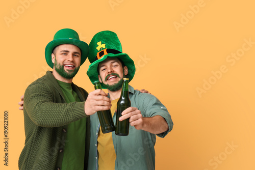 Young men in leprechaun hat...