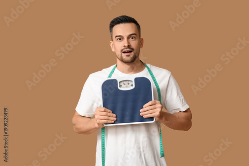 Handsome sporty shocked man...