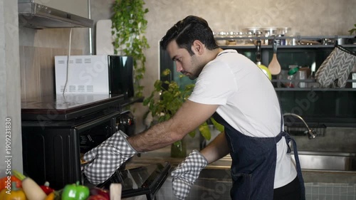 Male Influencer is Making the pizza at home. Food, cooking, lifestyle, small business.