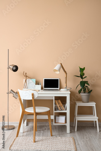 Stylish workplace with mode...