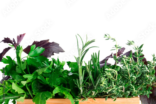 Wooden box with fresh herbs...