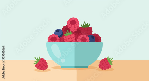 A light blue bowl overflowing with ripe raspberries and blueberries