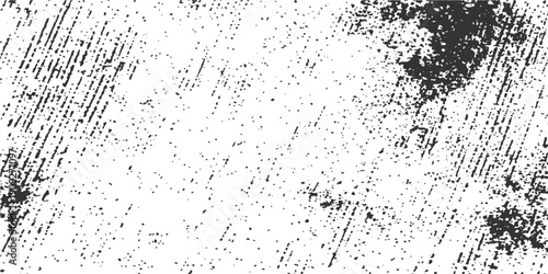 Abstract black and white grunge background design featuring an artistic ink splash pattern with textured paint splatters and dusty film grain elements