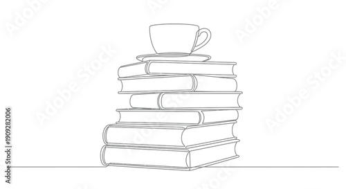 Stack of books with coffee cup