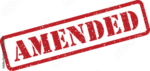A red rubber stamp impression with the word AMENDED prominently displayed inside a rectangular frame on white