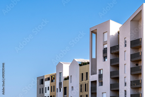 Modern residential apartments architecture facade with minimalism and skyline in Port Marianne Montpellier France presenting new housing district
