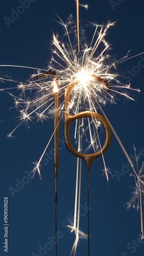 Wallpaper Mural 16 years celebration festive vertical footage made with Bengal fires in the form of number Sixteen. Torontodigital.ca