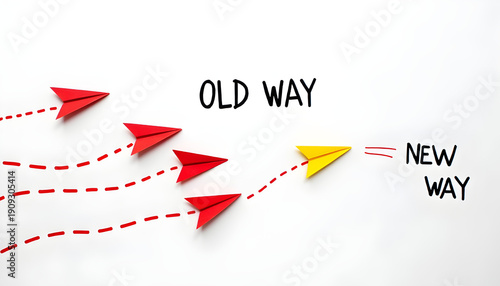 Red planes flying the old way and yellow paper planes flying the new way, changing path concept, different thinking, business leader, personality development idea concept