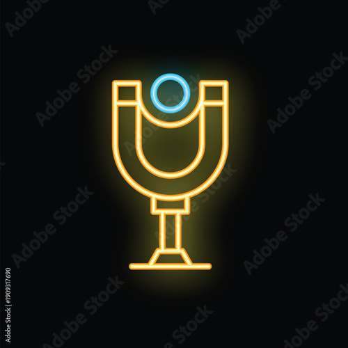 Yellow and blue neon icon of a magnet attracting a metal ball, representing the concept of attraction