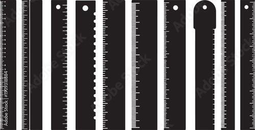 Collection of various black and white saw blades displayed