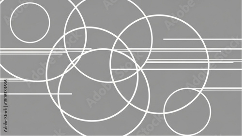 Geometric shapes intersecting with lines on a grey background viewed from directly above