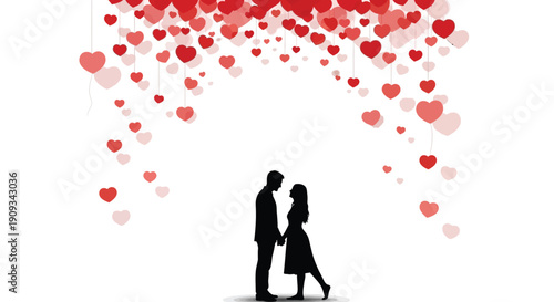 Couple silhouetted beneath a cascade of floating red and pink hearts