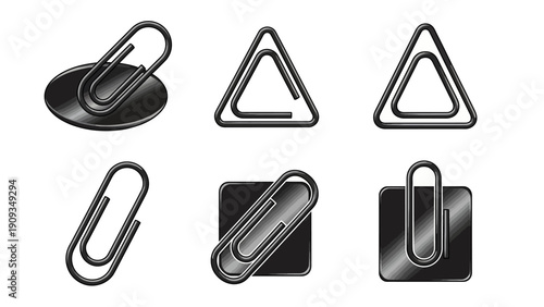 Set of realistic metallic paper clips and fasteners on white background