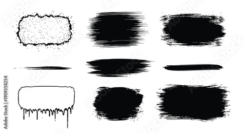 A collection of black brush strokes and smudges on a white background.