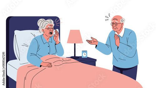 Elderly man looking concerned while his wife suffers from a painful headache in bed during the night in a bedroom.