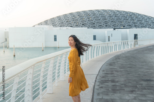 Photos Fashionable Young Asian Woman in Yellow Outfit Outside Louvre Abu Dhabi United A