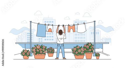 Man hanging laundry on clothesline with potted flowers and cityscape background