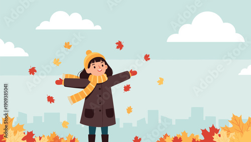 Happy girl wearing a warm coat and yellow hat celebrates autumn as colorful leaves fall against a distant city skyline background.