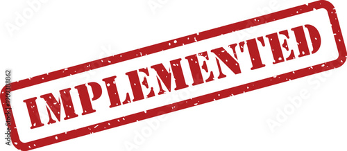 A clear red rubber stamp featuring the word IMPLEMENTED prominently displayed on a clean white sheet