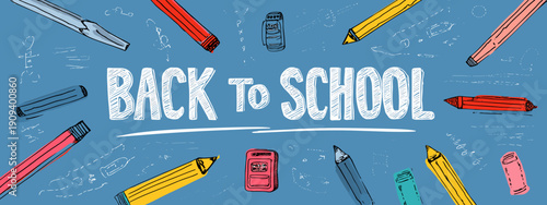 chalk drawing on a blackboard with text Back to school banner 