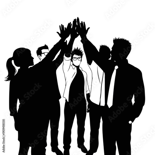 A group of business professionals stacking their hands in a show of unity and teamwork