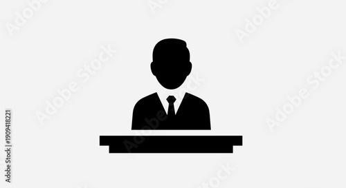 Businessman standing at podium.