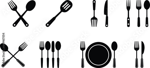 Black silhouettes of various forks knives spoons on white utensils
