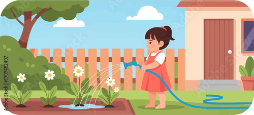 A small child waters flowers with a hose in a sunny backyard
