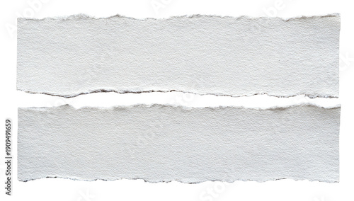 Two torn, textured rectangular paper pieces on a black backdrop. Close up. White. Rough edges