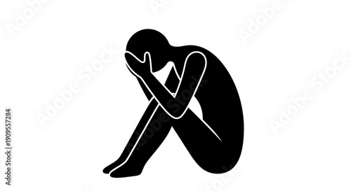 Silhouette of a Person Sitting in Despair with Head in Hands, Feeling Sad and Anxious, on an Isolated White Background