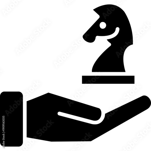 Hand holding chess piece Icon