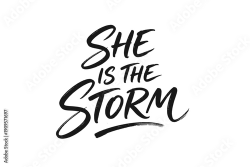 Handwritten phrase "SHE IS THE STORM" in brush lettering