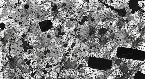 Dynamic black and gray splatter artwork with bold brushstrokes