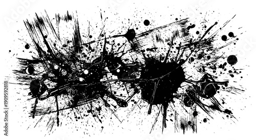 Dynamic black ink splatters on white background for creative design
