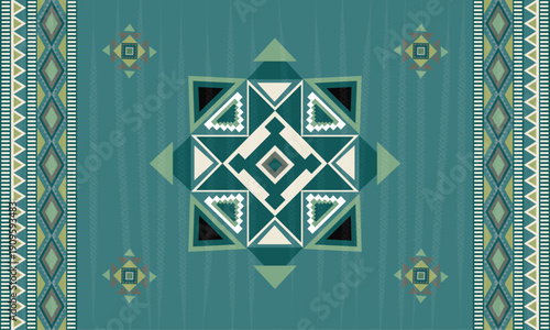 A rug featuring geometric patterns inspired by Native American or Southwestern tribal designs, with layered diamond shapes at the center surrounded by triangles. 
