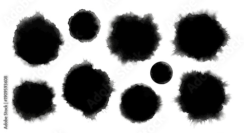 Set of black ink splatters on white background for design