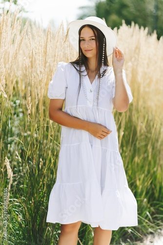 Wallpaper Mural Woman In White Dress Amid Tall Grass. Summer Fashion And Nature Concept. Torontodigital.ca