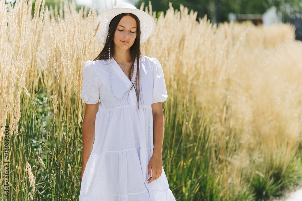 custom made wallpaper toronto digitalWoman Walking In White Dress Through Grass Field. Summer Style And Serene Nature.