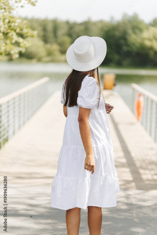 custom made wallpaper toronto digitalWoman Walking On Bridge In White Dress. Summer Fashion And Serene Lake View.