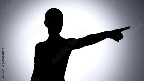 Wallpaper Mural Silhouette of a person with arm outstretched, pointing with a finger, against a white to gray gradient Torontodigital.ca