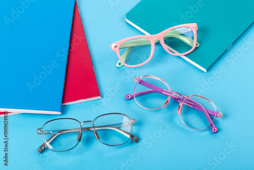 Colorful children's blue light blocking glasses with school notebooks