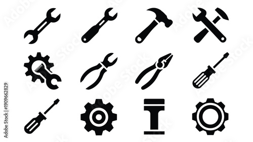 A collection of black silhouette tool icons including wrenches hammers and screwdrivers