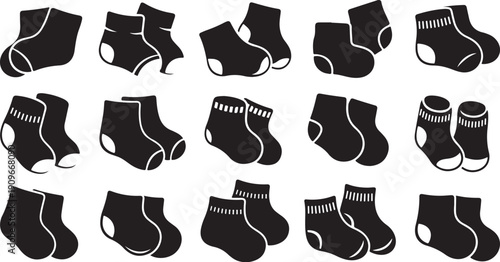 Collection of black and white socks in various styles