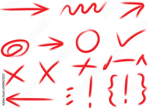 Collection of red hand drawn correction and annotation symbols against white background