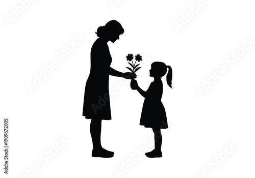 Silhouette of a woman giving flowers to a little girl