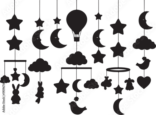 Black and white baby mobile with celestial shapes hanging